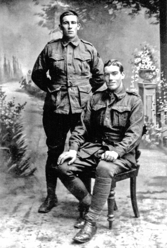 Frederick Knight (standing) with his cousin, Arthur Herbert Harrington (seated)
